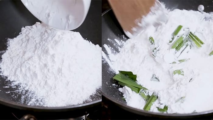 Rang bột năng với lá dứa để giúp bánh hồng Bình Định không dính và dễ cắt