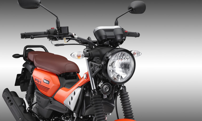 Hệ thống đèn pha Halogen dạng tròn cổ điển trên xe số địa hình Yamaha PG-1