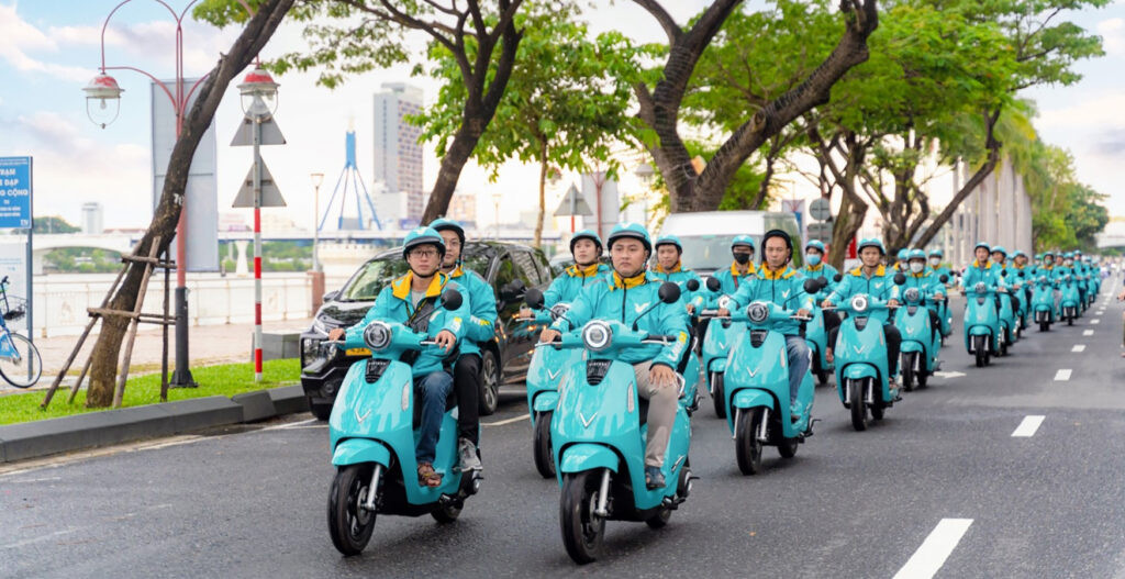 Hình ảnh logo xanh sm taxi vector màu lục lam biểu tượng cho sự di chuyển xanh