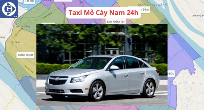 Một chiếc taxi màu trắng đậu bên đường