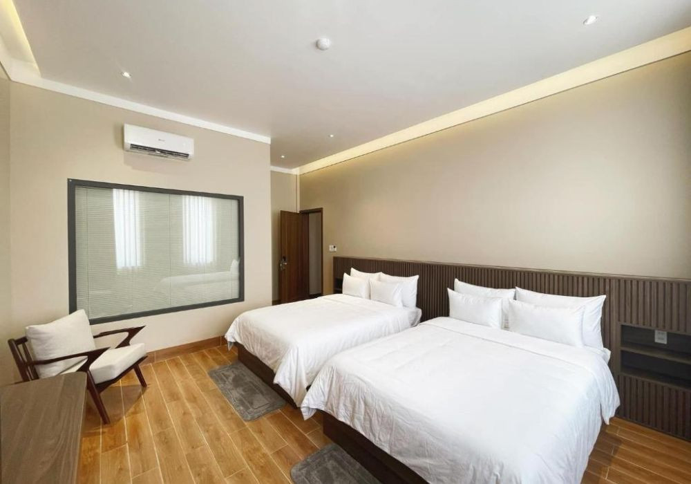 Phòng ngủ tiện nghi, hiện đại tại MELA Hotel Chư Sê