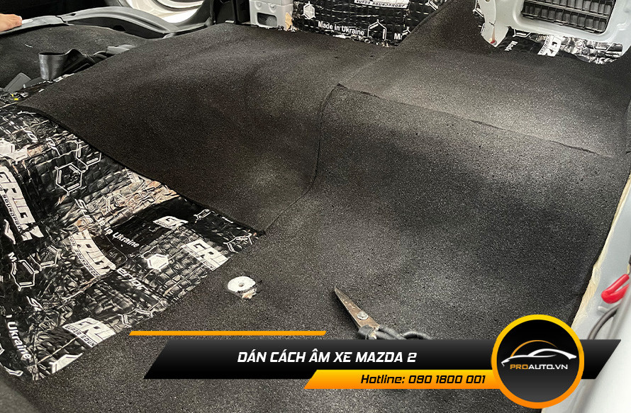 Thi công dán tiêu âm xe Mazda 2