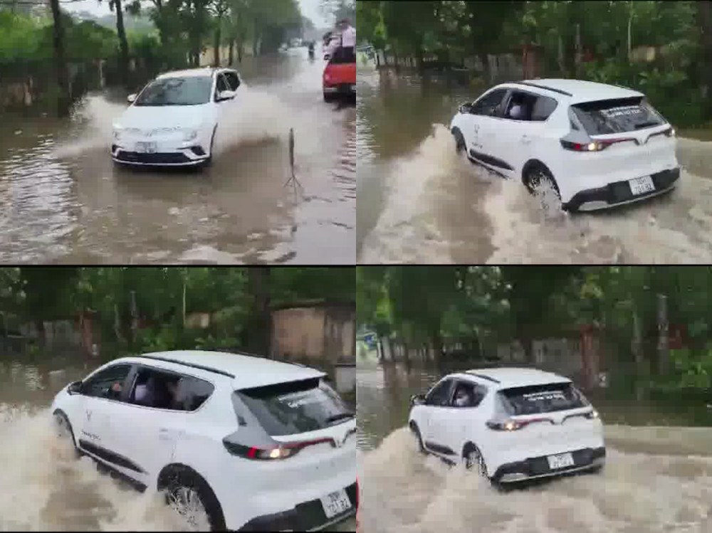 Xe ô tô điện VinFast di chuyển an toàn qua vùng nước ngập