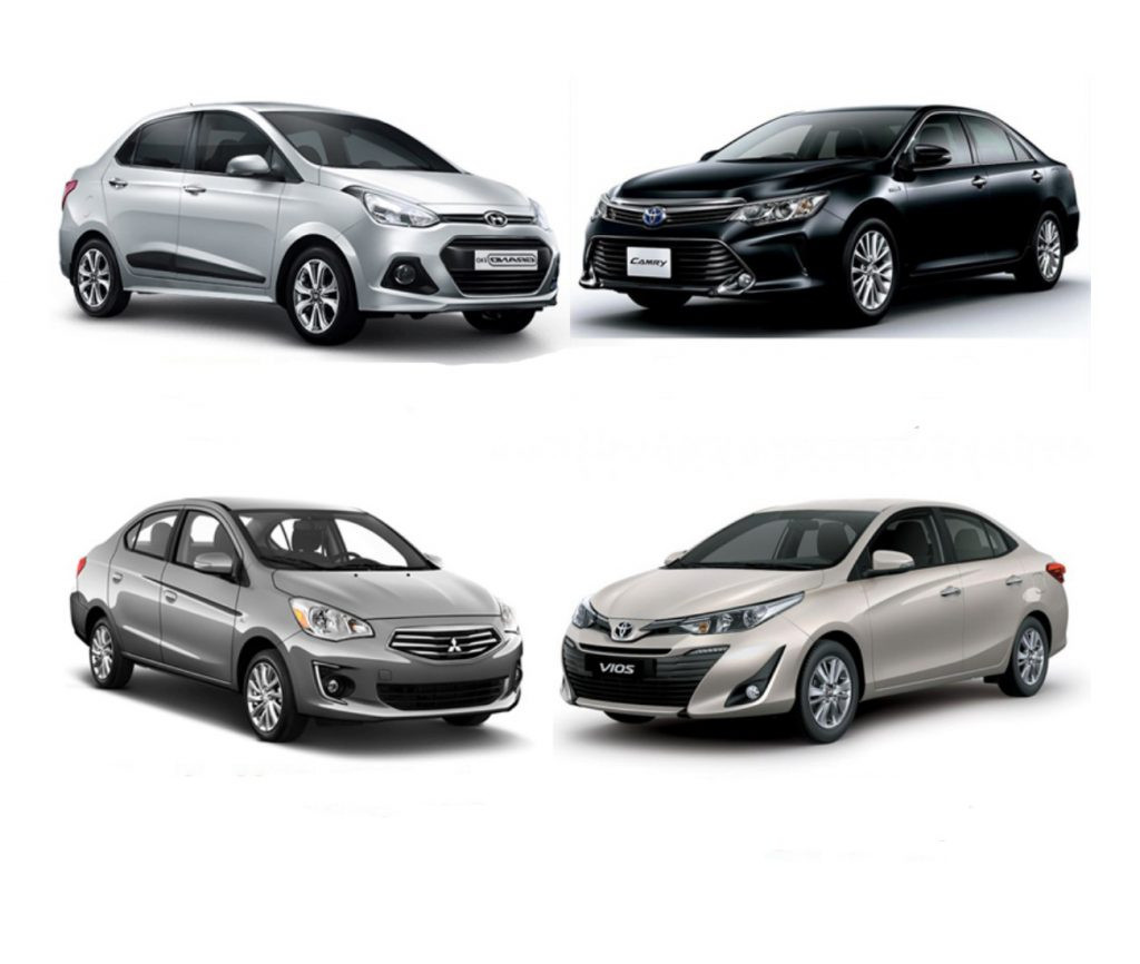 Xe taxi hiện đại đang di chuyển trên đường phố, biểu tượng của dịch vụ vận chuyển taxi tiện lợi.