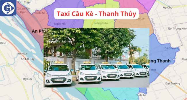 Xe taxi Thanh Thủy màu trắng di chuyển tại Cầu Kè Trà Vinh